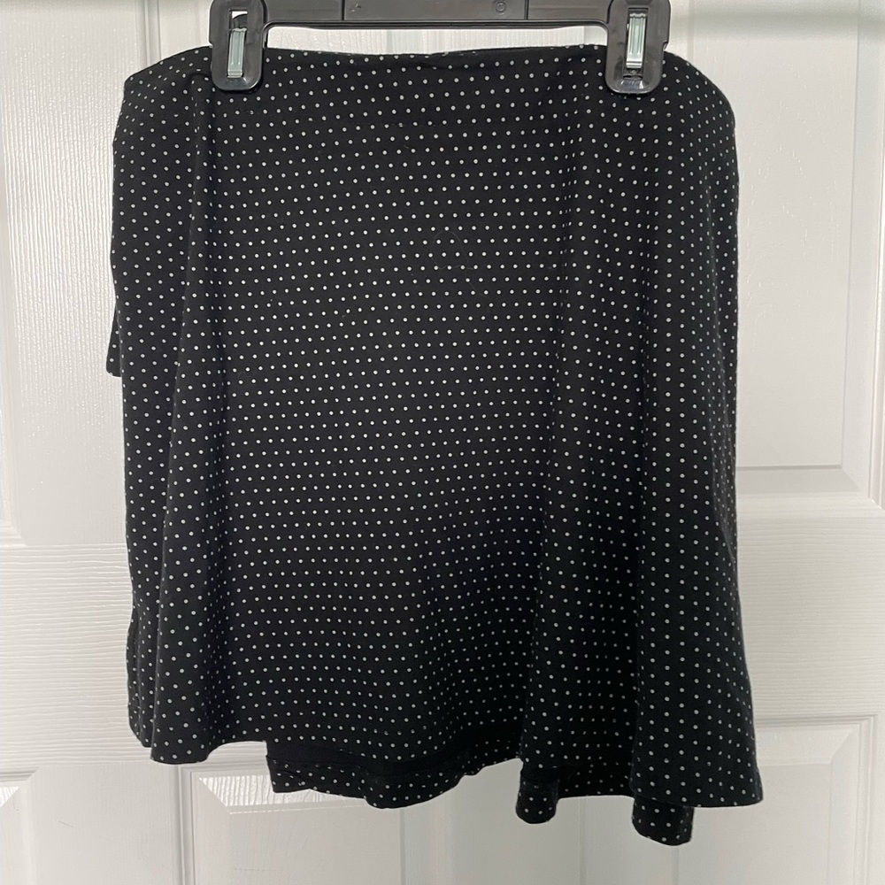 Black adjustable skirt from Brandy Melville which means it’s one size.